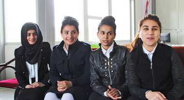 Girls talking about their new school designed and built by Welthungerhilfe in Domiz, Northern Iraq.