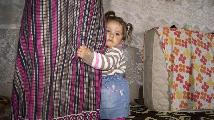 Family Latif, Syrian refugees in Turkey, girl in her house. 