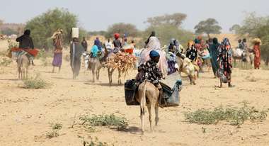 Sudanese refugees who have fled the violence in the Darfur region seek temporary refuge in Goungour, Chad