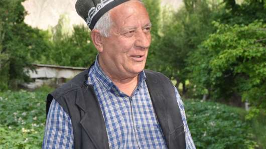 Azim Choragabov (65) in his garden in Pokhut village, Zerafshan valley, Northern Tajikistan.