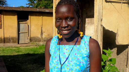 Porträtfoto von Asio Faith Evelyn aus Uganda.