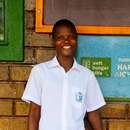 Porträtfoto der Schülerin Akorio Grace aus Uganda.